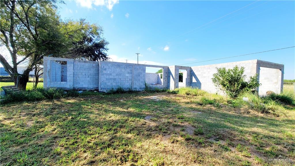 1925 Ash Avenue Mercedes, TX 78570 - Photo 12 of 16 Front of house with concrete block siding