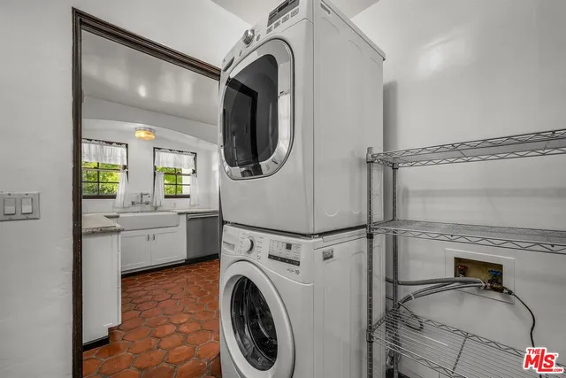 a utility room with dryer and washer