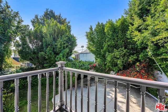 a view of backyard with green space