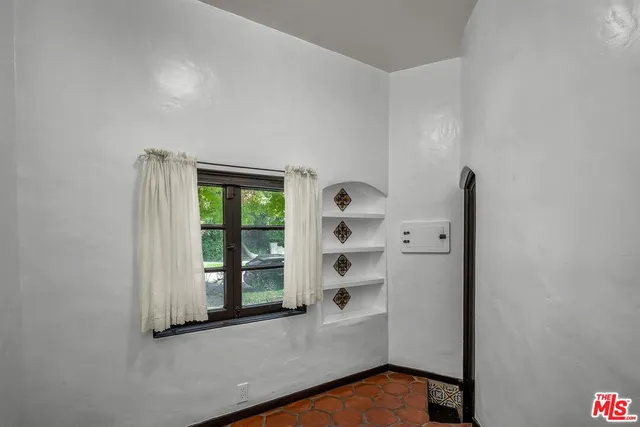 a view of a hallway with closet