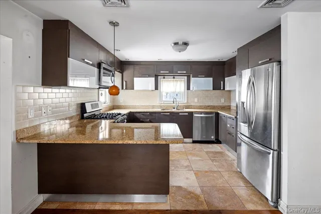 $1,299,000 | 38 Johnson Place, Woodmere, NY 11598