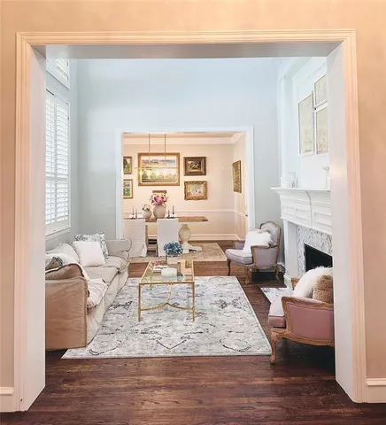 a living room with furniture or couch and a fireplace
