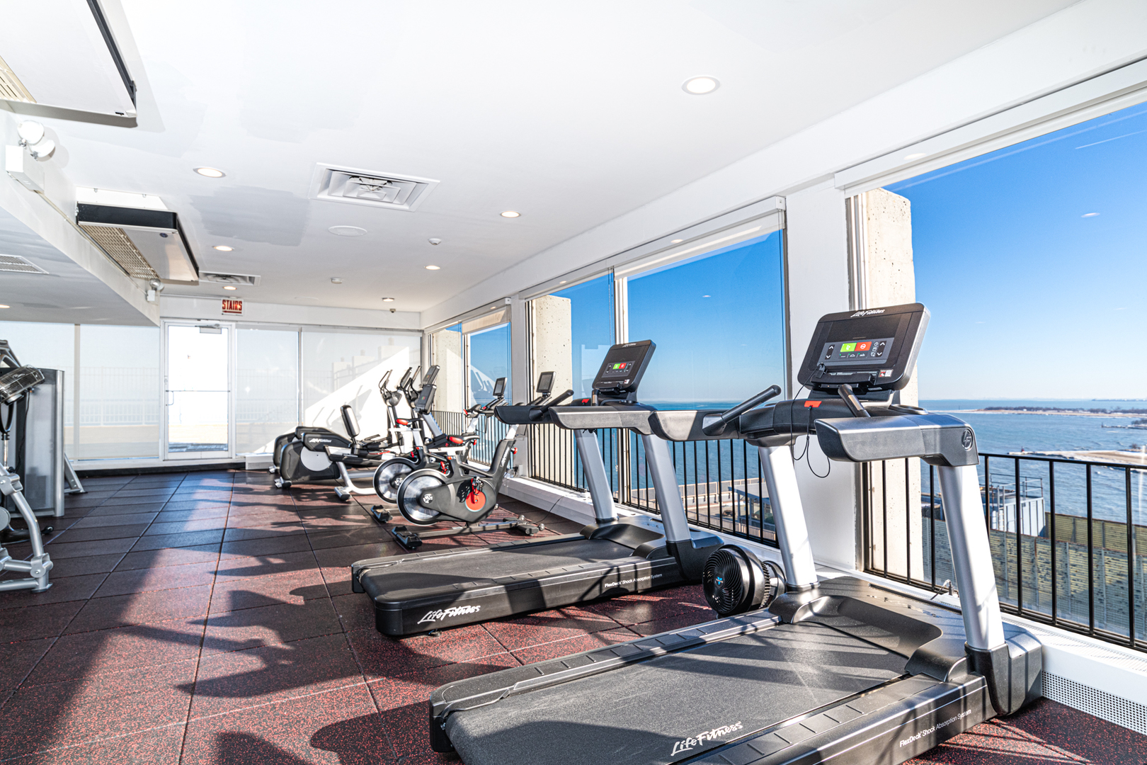6171 North Sheridan Road, Unit 2404 Chicago, IL 60660 - Photo 2 of 16 a view of a room with gym equipment