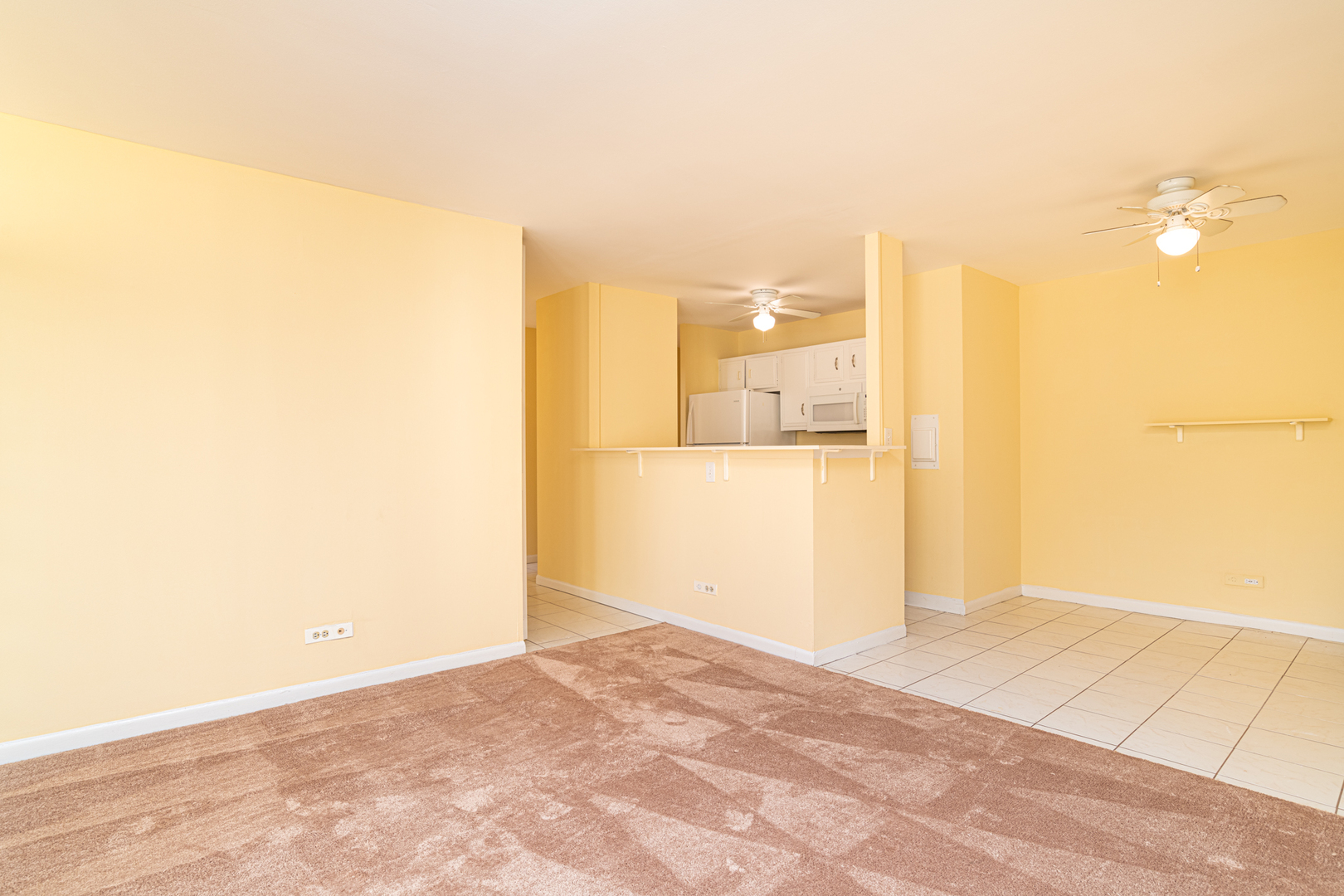 6171 North Sheridan Road, Unit 2404 Chicago, IL 60660 - Photo 7 of 16 a view of a room with a wooden floor