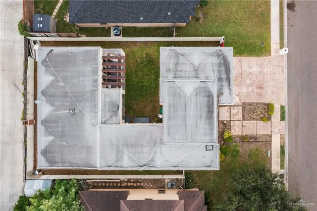 view of a bathroom with a shower and a sink