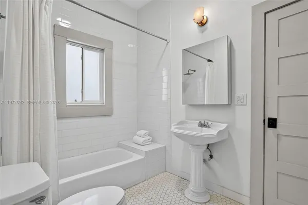 a front view of a house with a porch