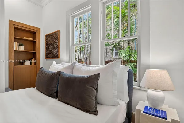 an aerial view of houses with yard