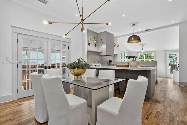 a bedroom with a bed and a table in it