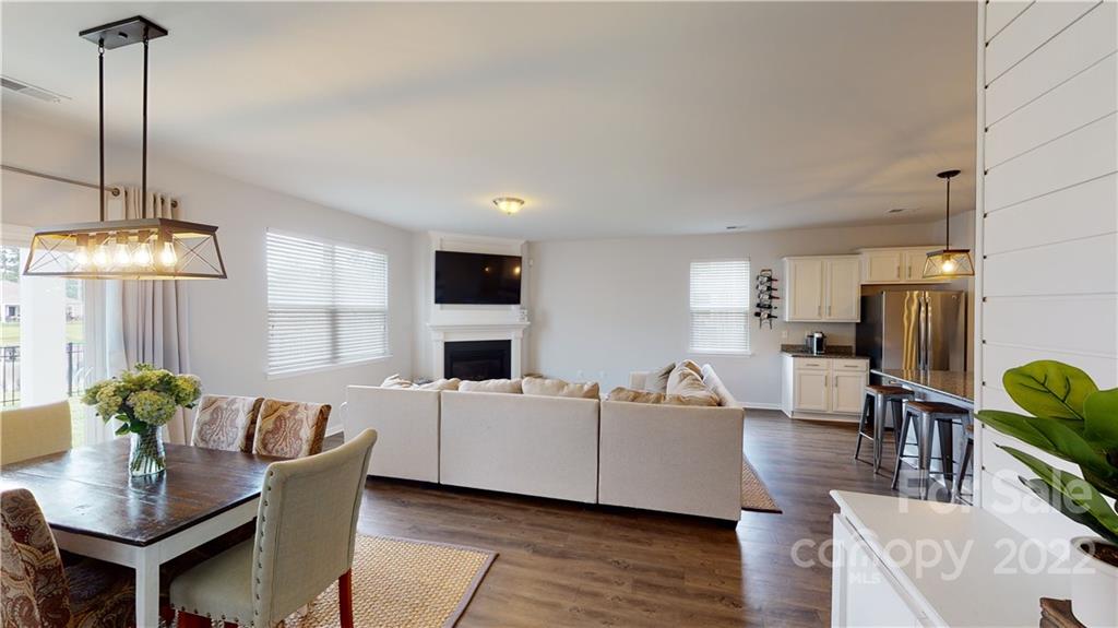 408 Accord Street Myrtle Beach, SC 29588 - Photo 16 of 43 a living room with furniture and a fireplace