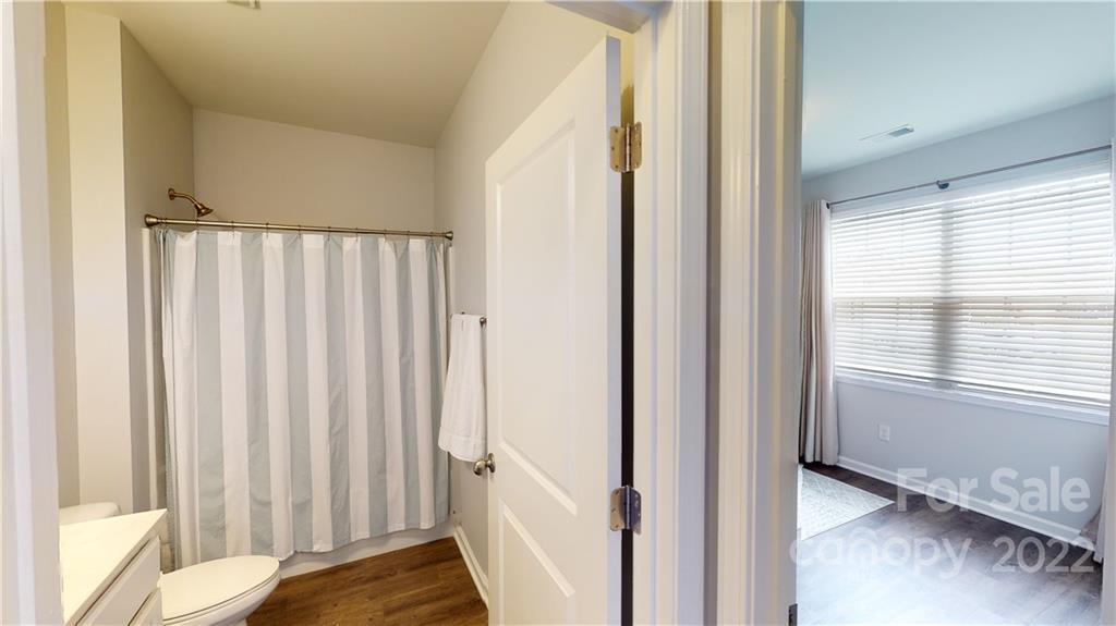408 Accord Street Myrtle Beach, SC 29588 - Photo 25 of 43 a view of a hallway with wooden floor and a window