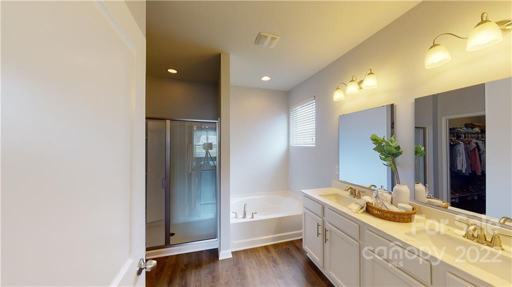 408 Accord Street Myrtle Beach, SC 29588 - Photo 32 of 43 a bathroom with a granite countertop sink and a large mirror
