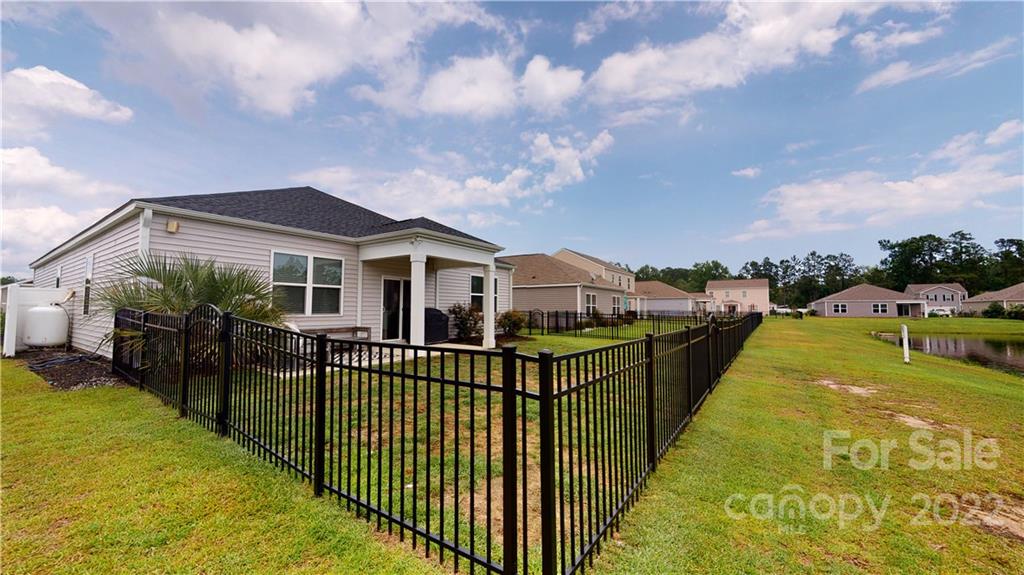 408 Accord Street Myrtle Beach, SC 29588 - Photo 37 of 43 a view of a house with swimming pool and sitting area