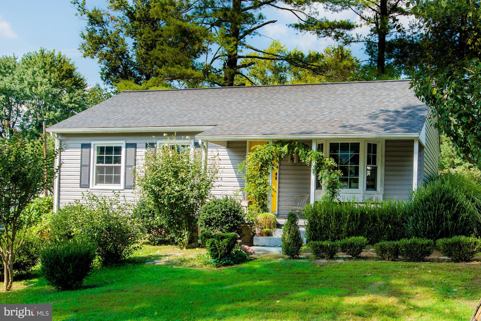 800 Blue Ridge Avenue Middleburg, VA 20117 - Photo 12 of 19 a front view of a house with a yard