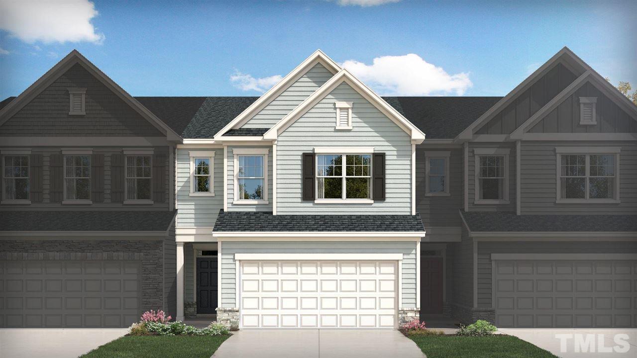 6538 Mezzo Lane Raleigh, NC 27616 - Photo 1 of 1 a front view of a house with a yard