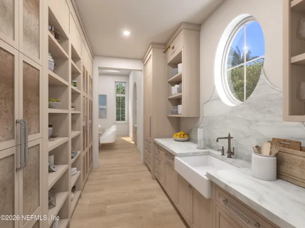 a spacious bathroom with a double vanity sink and a mirror