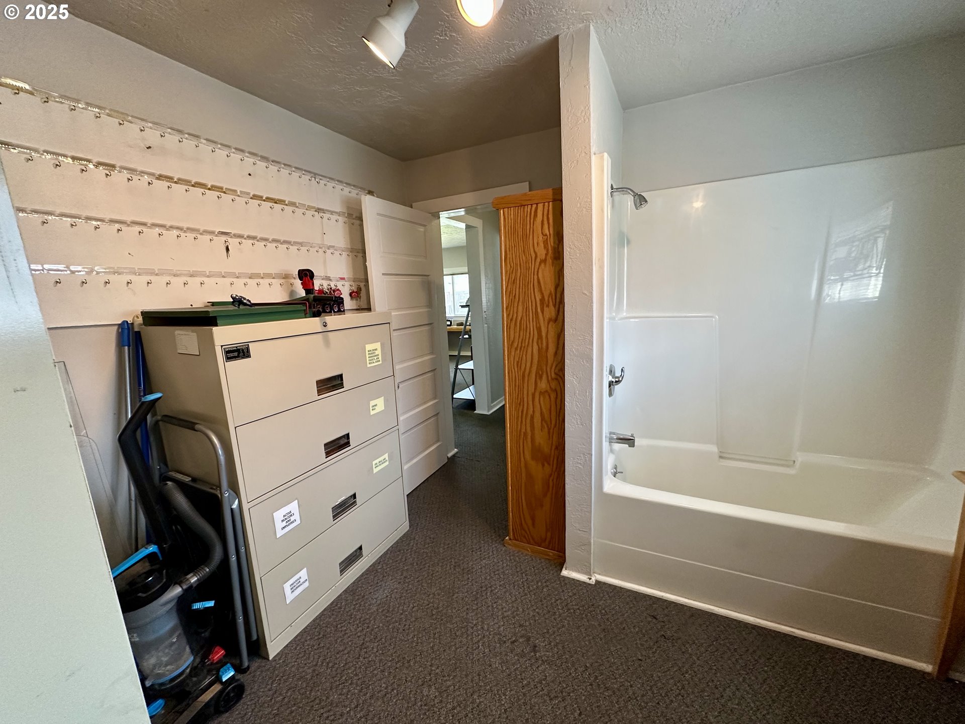 83 Swain Lane Eugene, OR 97404 - Photo 13 of 23 a bathroom with a tub and shower