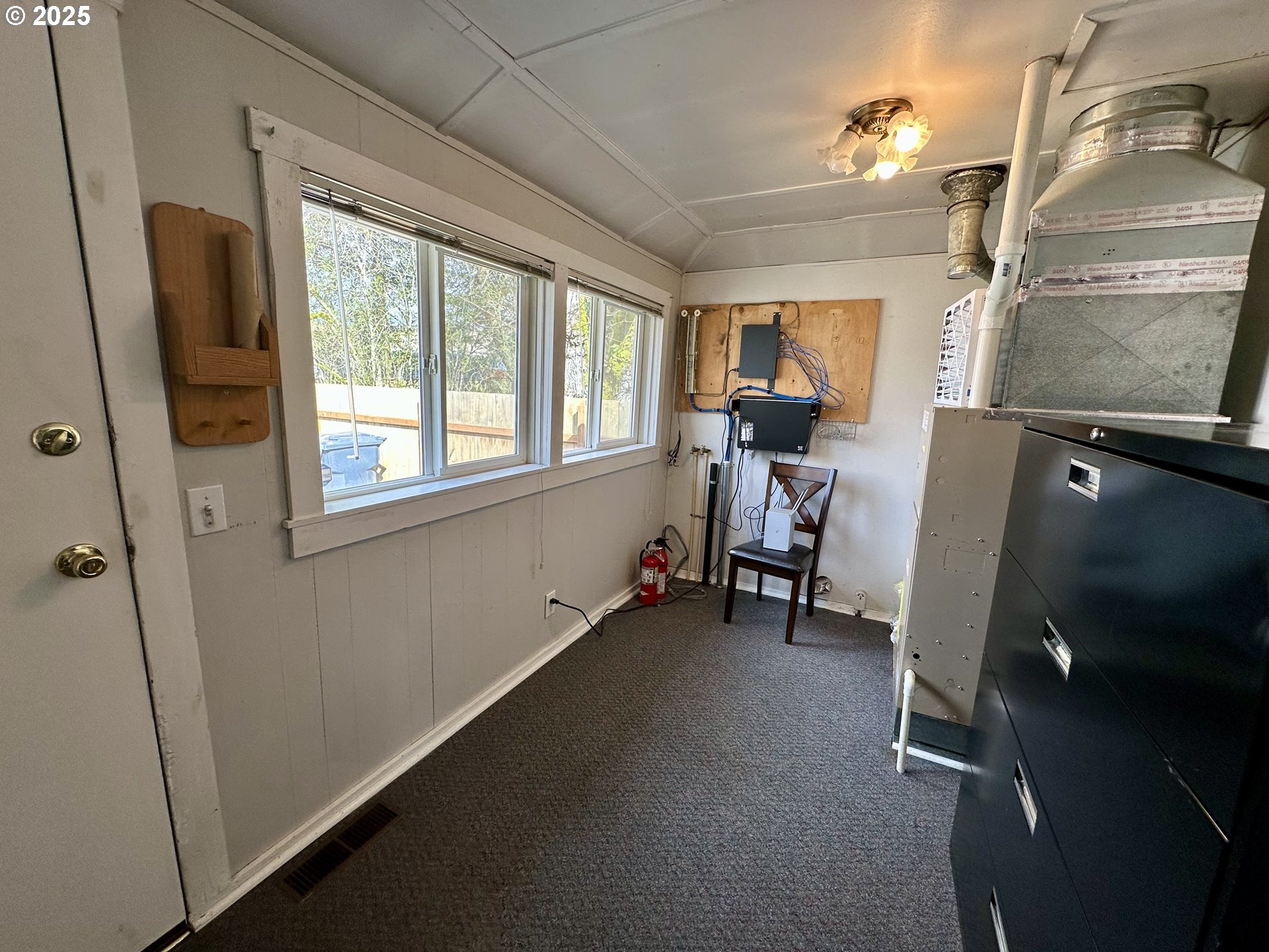 83 Swain Lane Eugene, OR 97404 - Photo 17 of 23 a view of a livingroom with furniture and a window