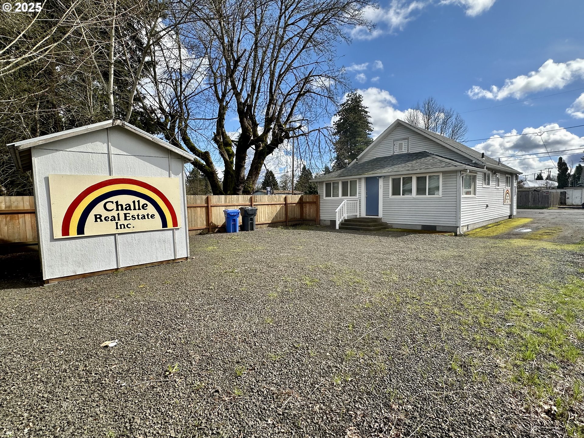 83 Swain Lane Eugene, OR 97404 - Photo 20 of 23 a view of a house with a yard