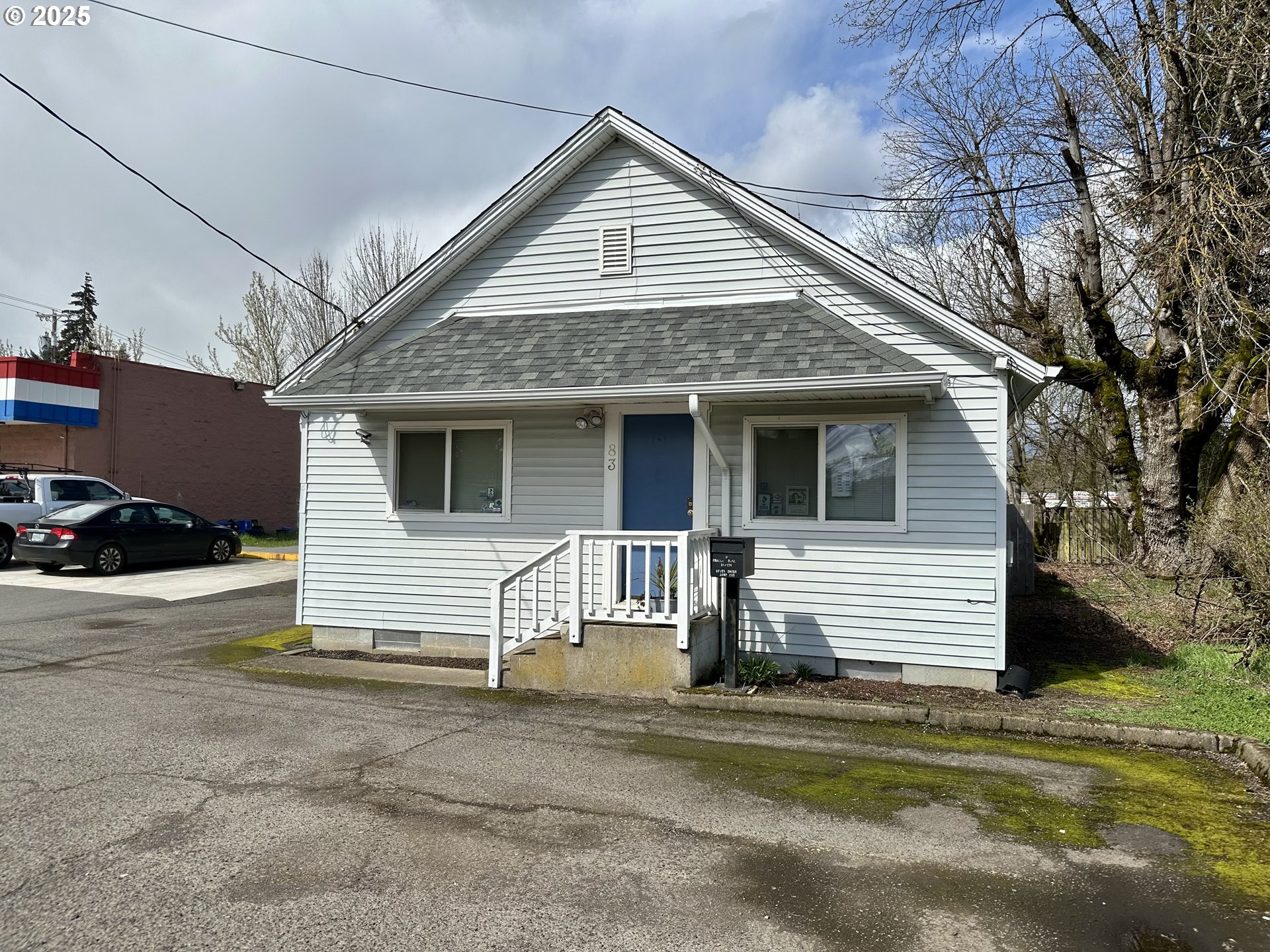 83 Swain Lane Eugene, OR 97404 - Photo 2 of 23 a front view of a house with a yard