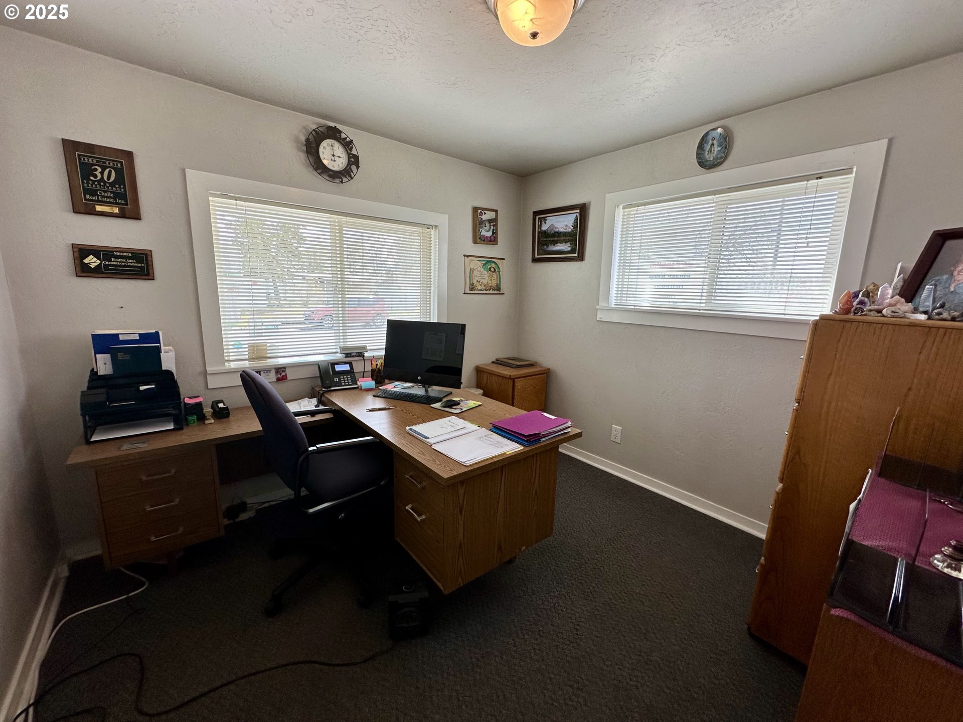 83 Swain Lane Eugene, OR 97404 - Photo 10 of 23 a view of workspace with wooden floor windows