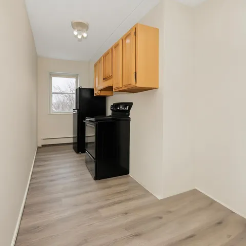 a view of workspace with wooden floor