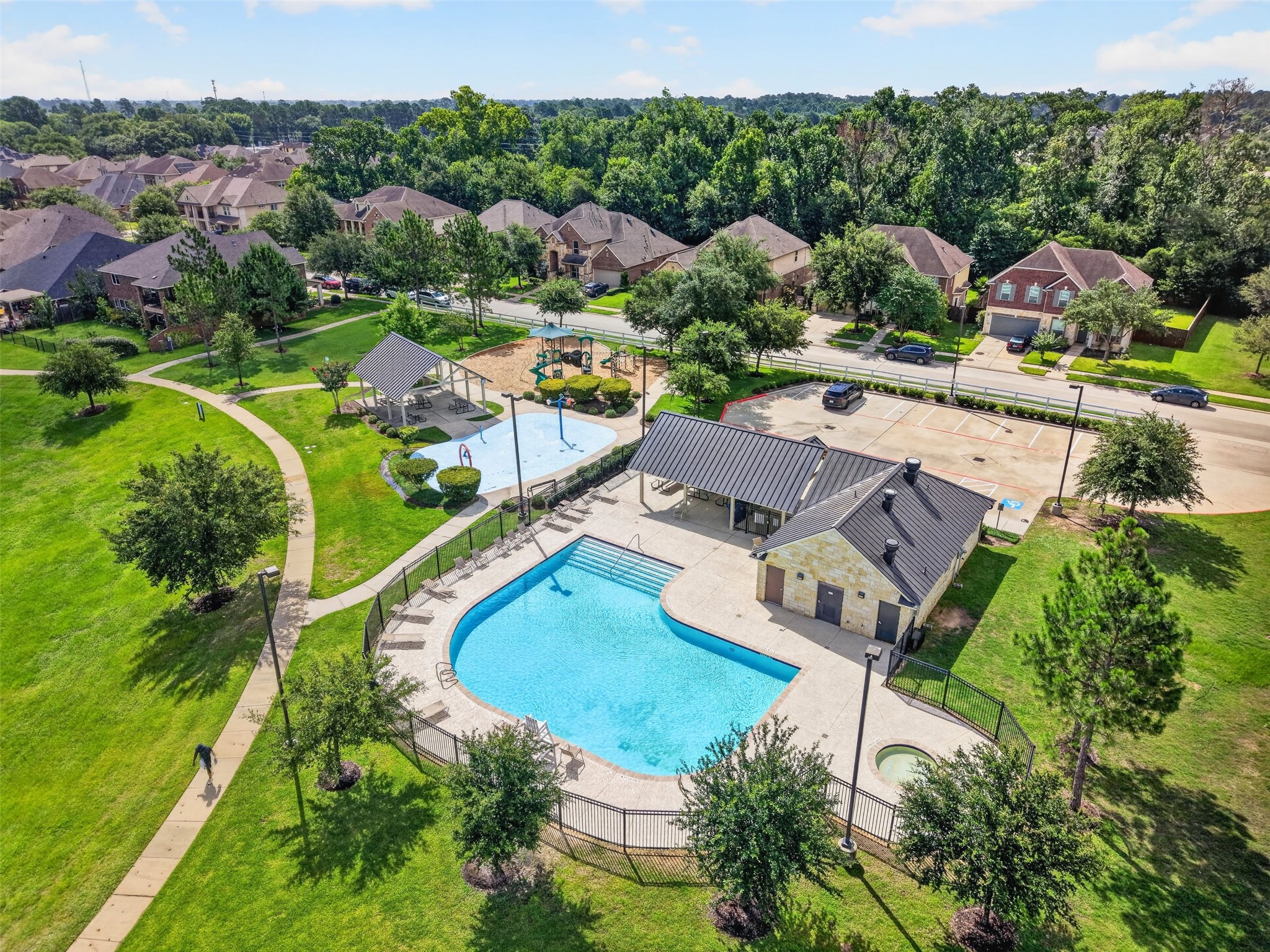 18202 Wedgewood Bluff Court Spring, TX 77379 - Photo 50 of 50 Aerial view of the community pool, playground, and neighborhood amenities.