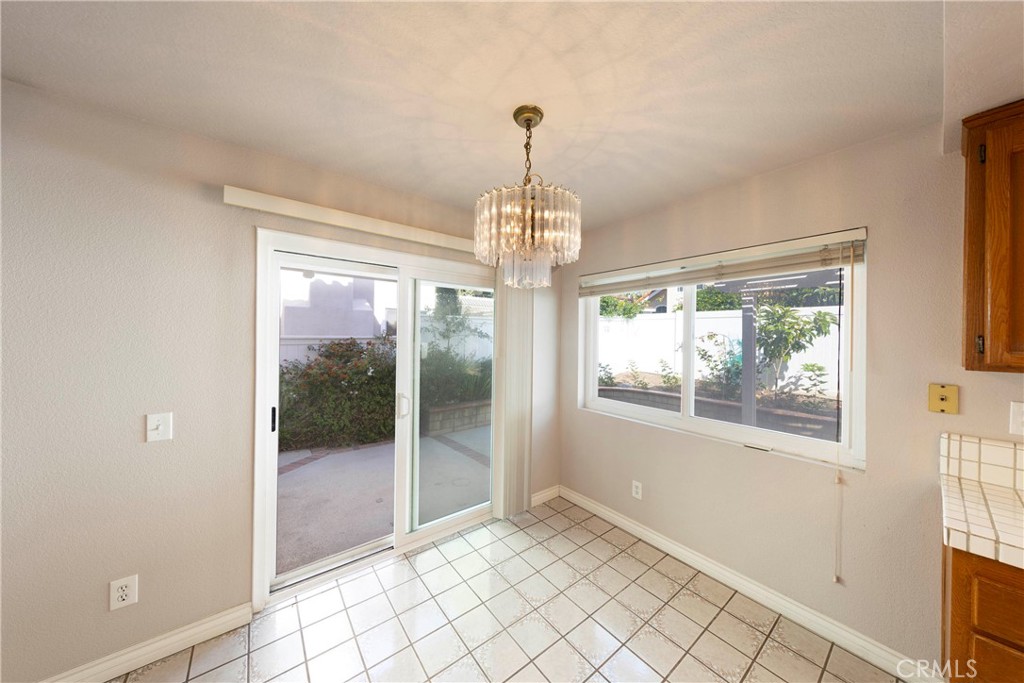 2 Bernini Irvine, CA 92614 - Photo 7 of 30 Direct access to backyard from kitchen.