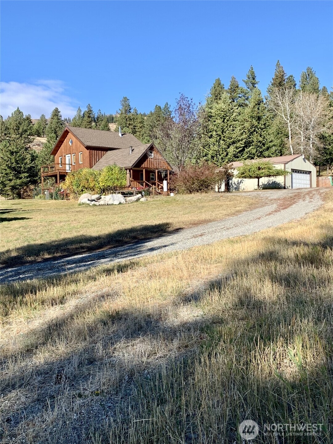 35 Low Ridge Road Malo, WA 99150 - Photo 2 of 38 a view of a lake with houses