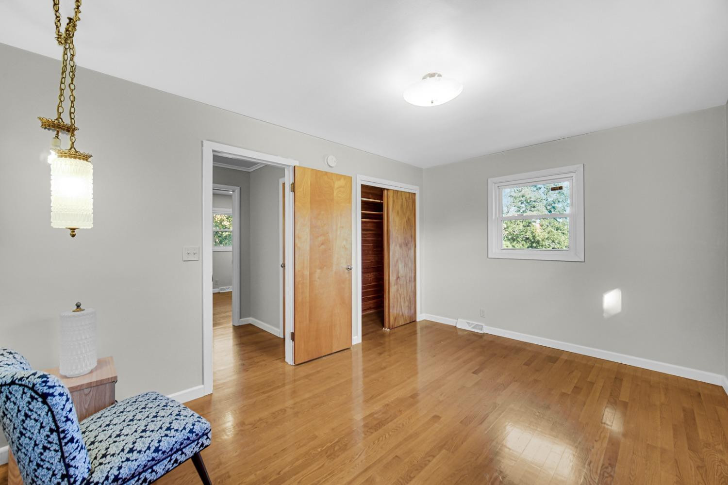 3508 Highway 20 Rolling Prairie, IN 46371 - Photo 14 of 29 wooden floor in an empty room