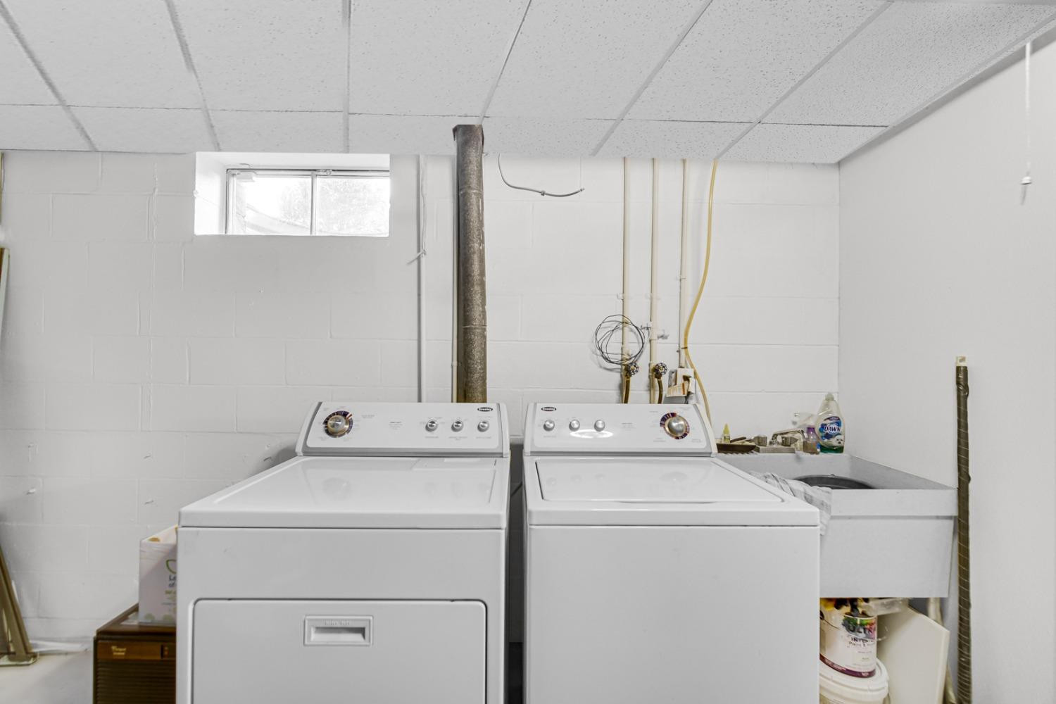 3508 Highway 20 Rolling Prairie, IN 46371 - Photo 20 of 29 a utility room with dryer and washer