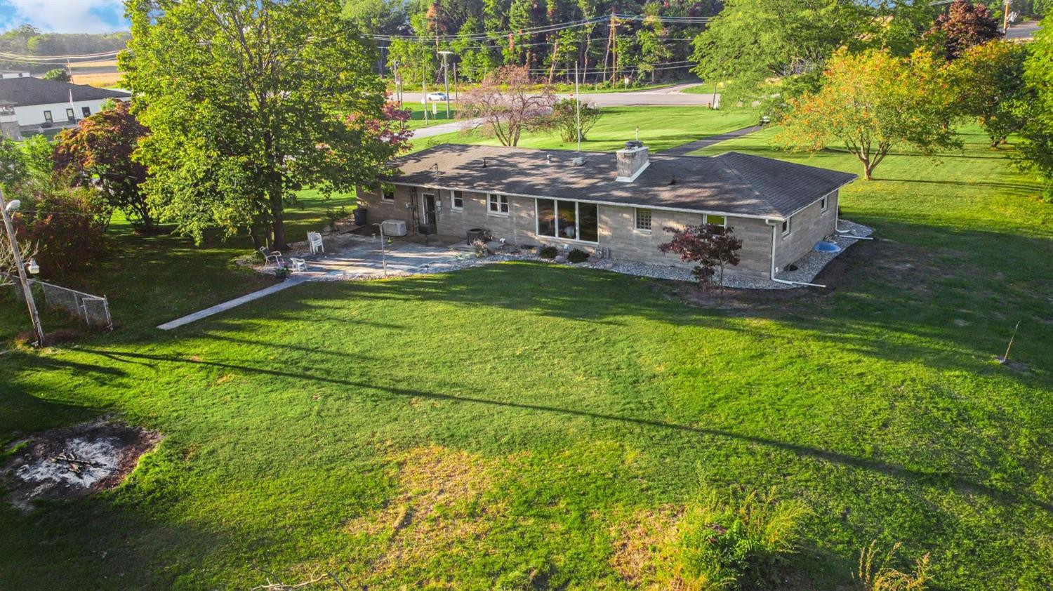 3508 Highway 20 Rolling Prairie, IN 46371 - Photo 25 of 29 a view of a house with a yard