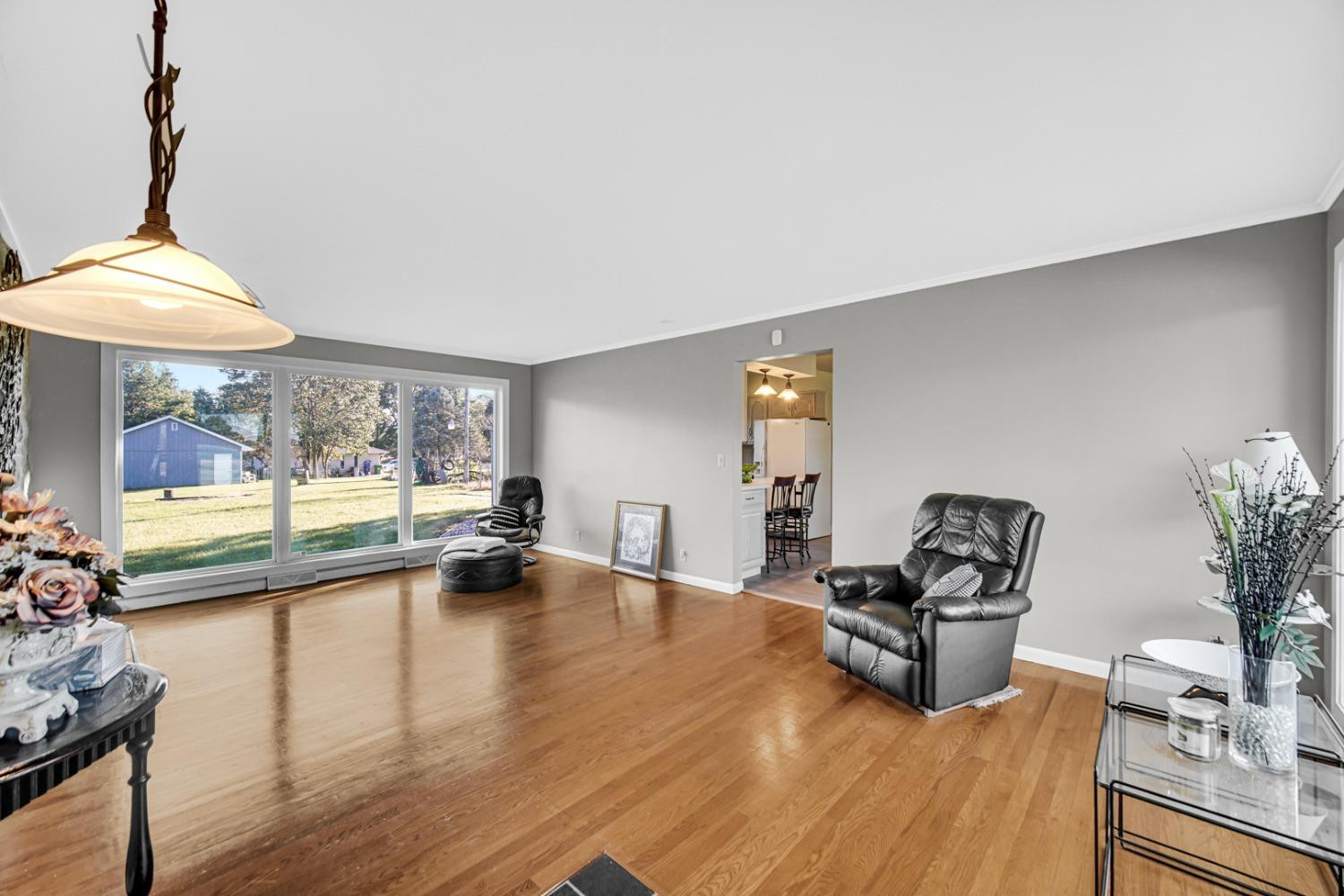 3508 Highway 20 Rolling Prairie, IN 46371 - Photo 6 of 29 a living room with furniture and a large window