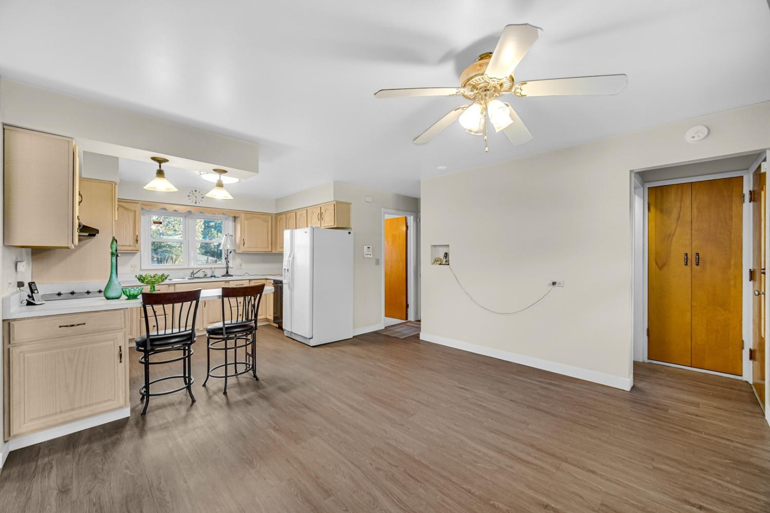 3508 Highway 20 Rolling Prairie, IN 46371 - Photo 9 of 29 a view of kitchen with cabinets and wooden floor