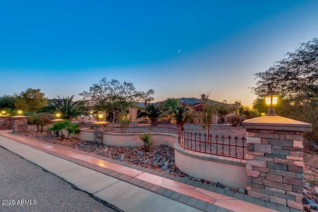 a view of a balcony with an outdoor seating