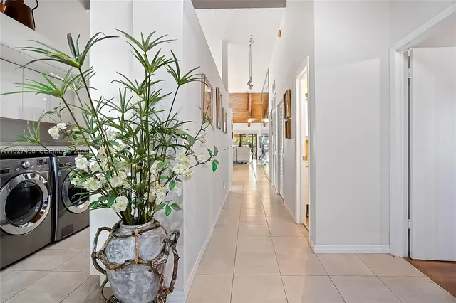 a living room with furniture and a painting