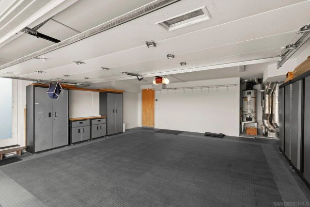 a view of empty room with ceiling fan
