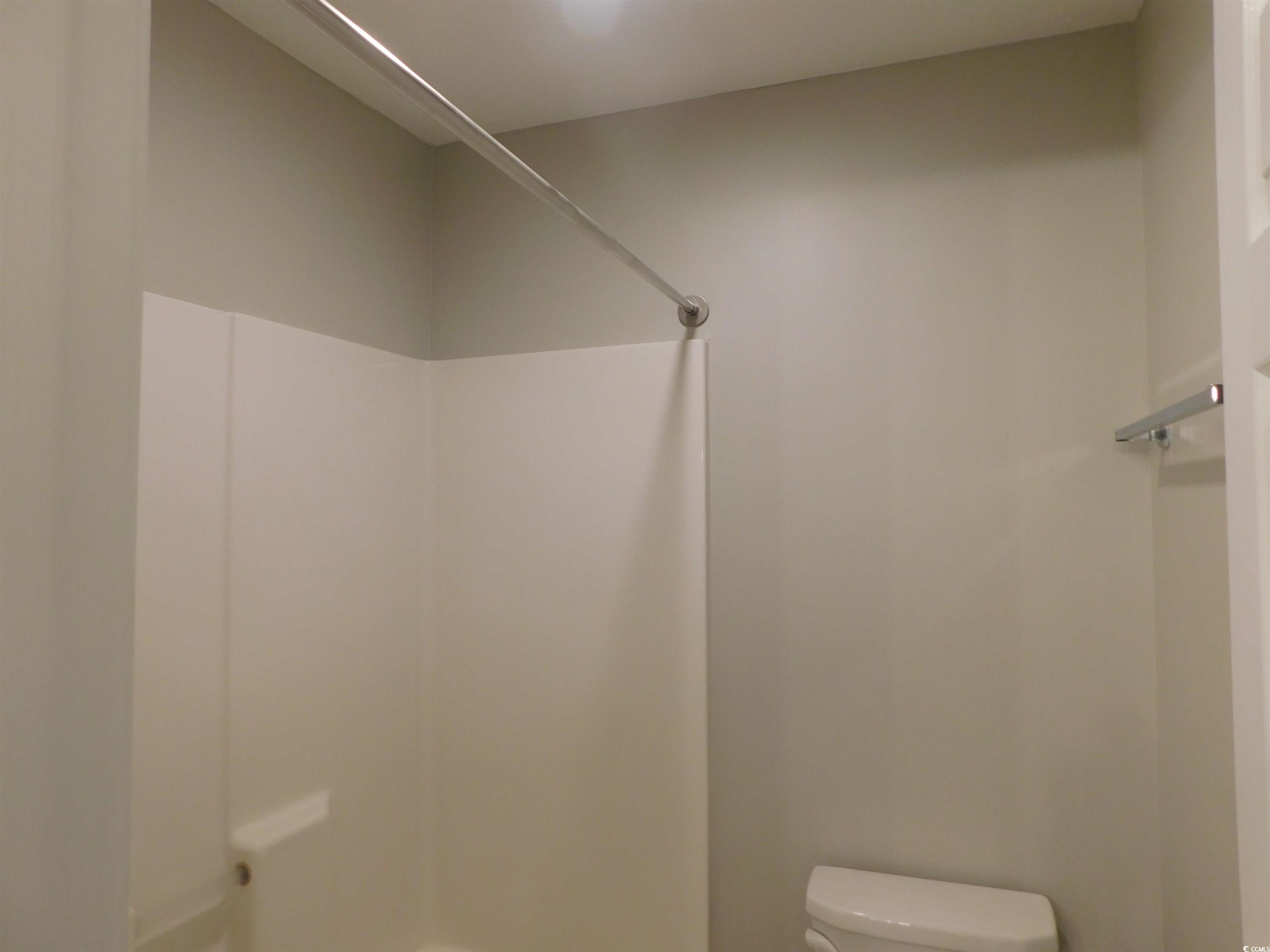 517 White River Drive, Unit BUILDING 22 G Myrtle Beach, SC 29579 - Photo 13 of 17 Bathroom with vanity and toilet