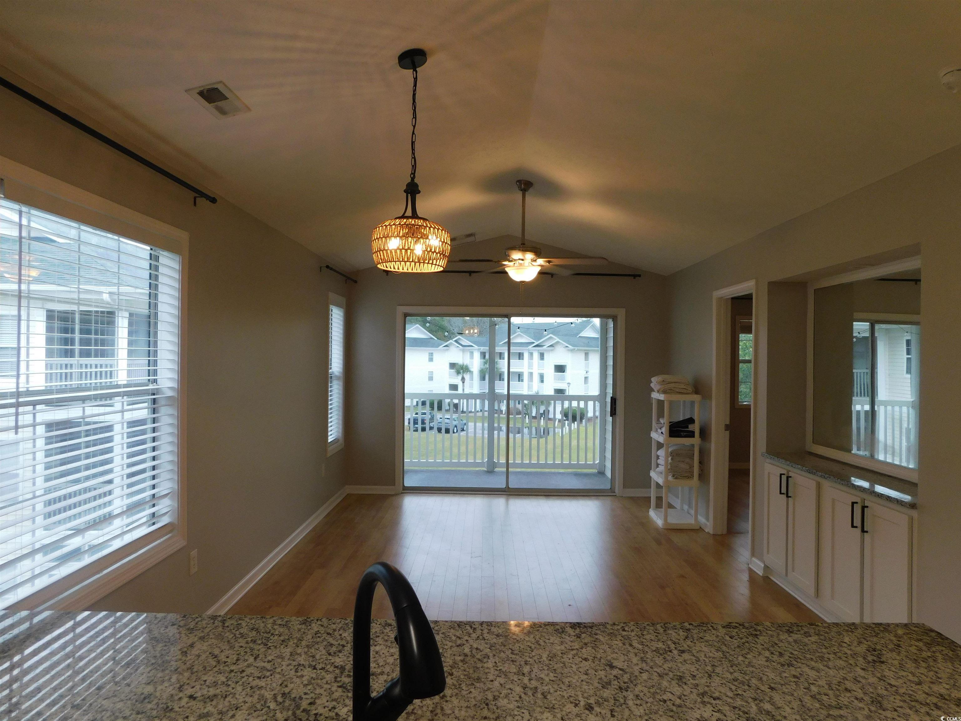 517 White River Drive, Unit BUILDING 22 G Myrtle Beach, SC 29579 - Photo 7 of 17 Laundry area featuring stacked washer and clothes dryer