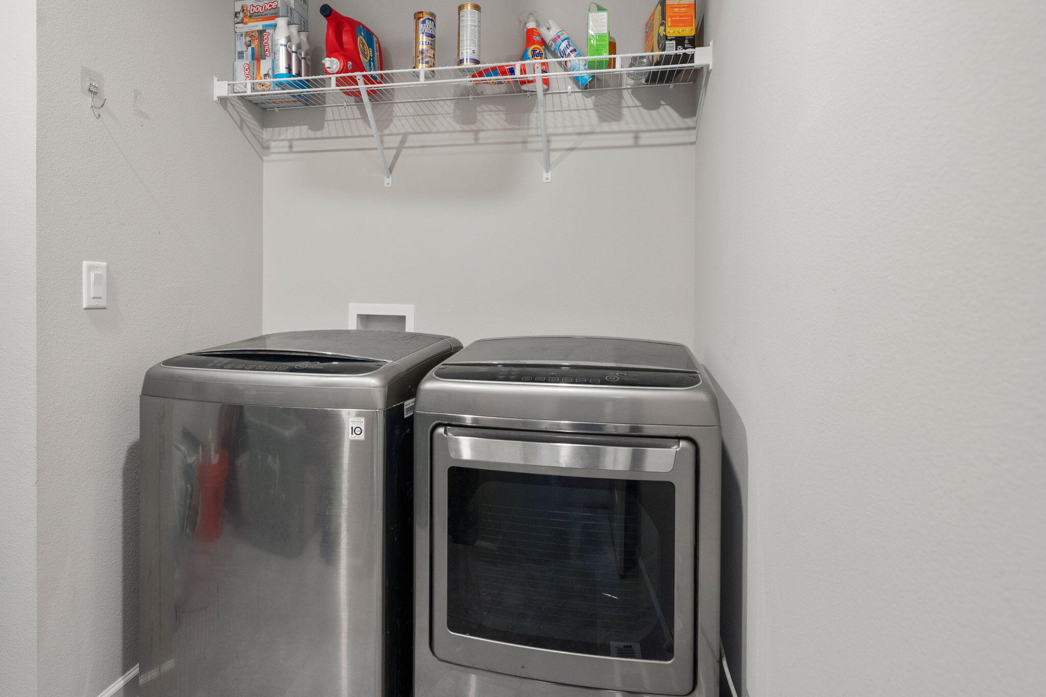 4039 Southwest Quartz Place Redmond, OR 97756 - Photo 25 of 44 a utility room with dryer and washer