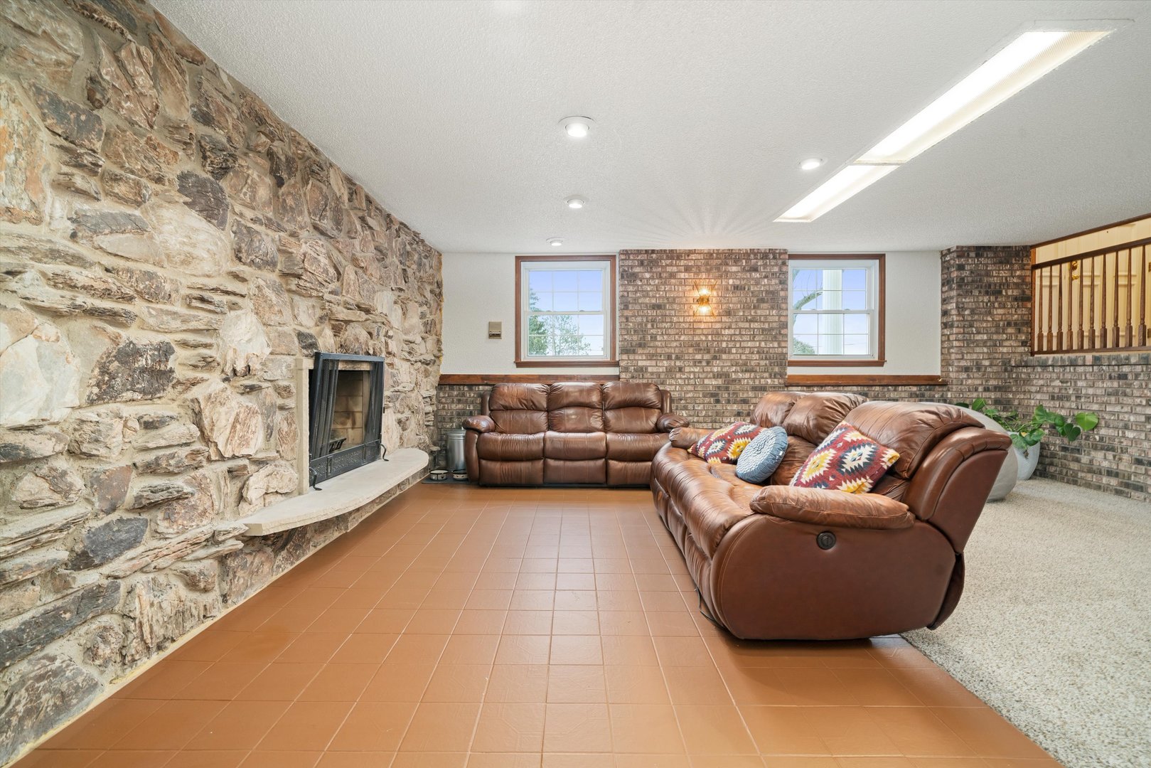21204 South Pfeiffer Road Frankfort, IL 60423 - Photo 26 of 45 a living room with furniture and a fireplace