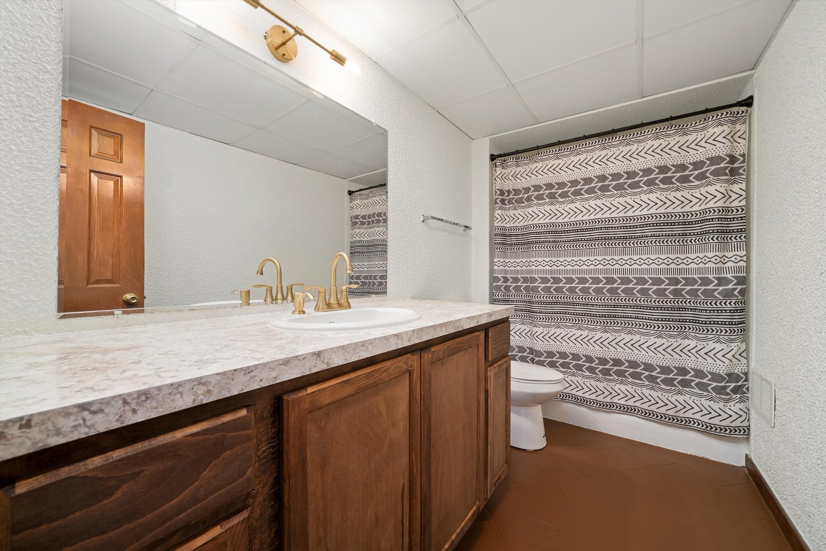 21204 South Pfeiffer Road Frankfort, IL 60423 - Photo 28 of 45 a bathroom with a granite countertop sink and a mirror