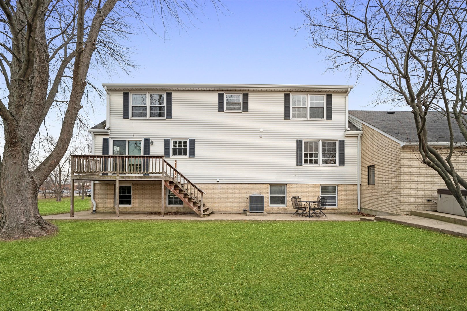 21204 South Pfeiffer Road Frankfort, IL 60423 - Photo 32 of 45 a view of a house with backyard and a tree