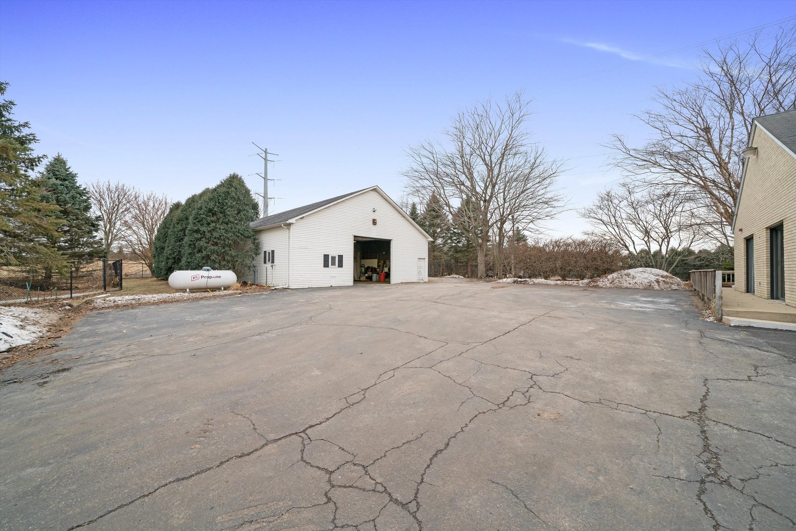 21204 South Pfeiffer Road Frankfort, IL 60423 - Photo 43 of 45 a view of white house with a yard and garage