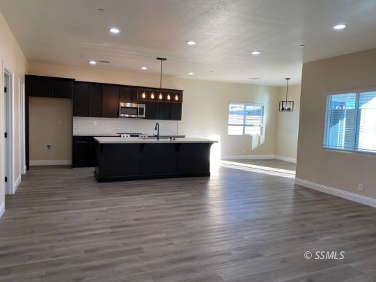 1046 Ocean Avenue Ridgecrest, CA 93555 - Photo 3 of 19 a view of kitchen with sink and natural light