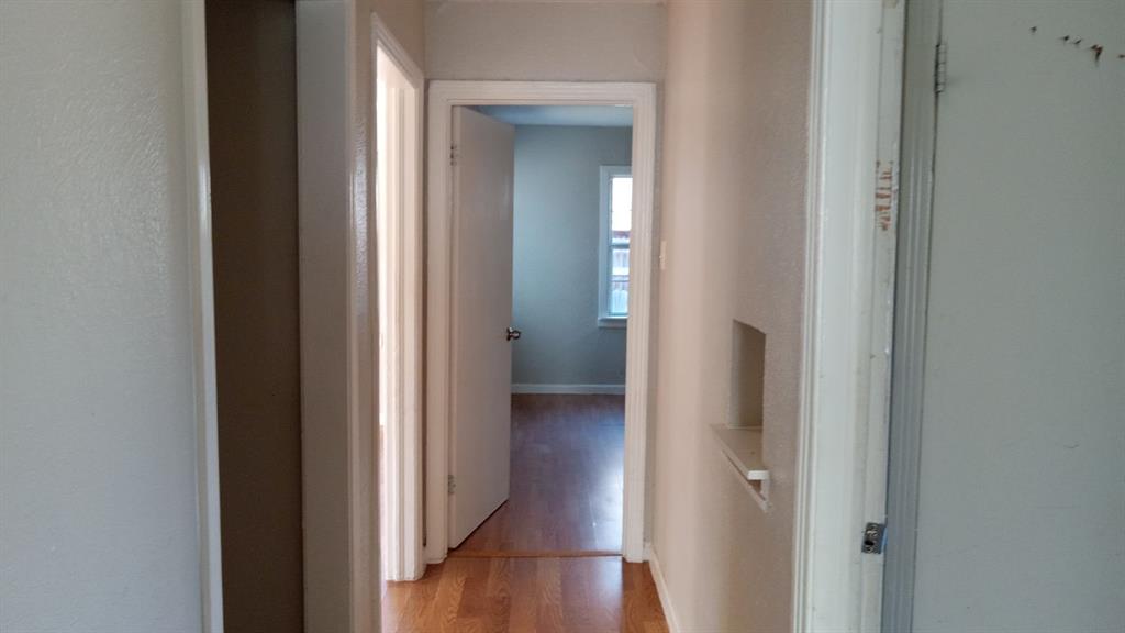 1510 Carson Street Dallas, TX 75216 - Photo 29 of 29 a view of a hallway with wooden floor