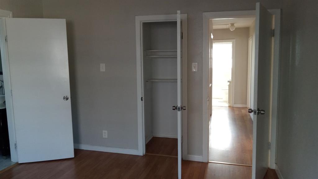 1510 Carson Street Dallas, TX 75216 - Photo 5 of 29 a view of cabinet with mirror