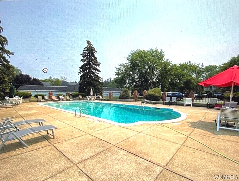 4547 Chestnut Ridge Road, Unit 219B Amherst, NY 14228 - Photo 36 of 36 Photo taken in Summer 2025. Pool opens Memorial Da