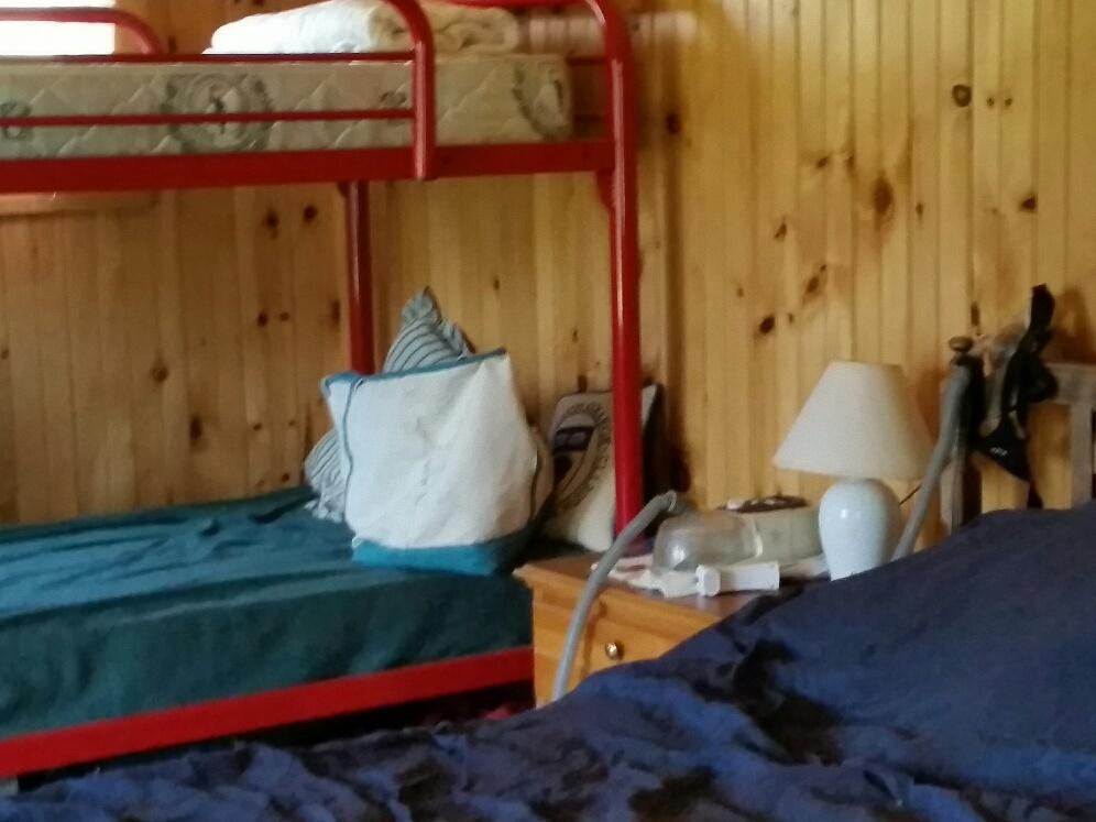124 Dallas Hill Road Dallas Plt, ME 04970 - Photo 10 of 27 Bunks and queen bed