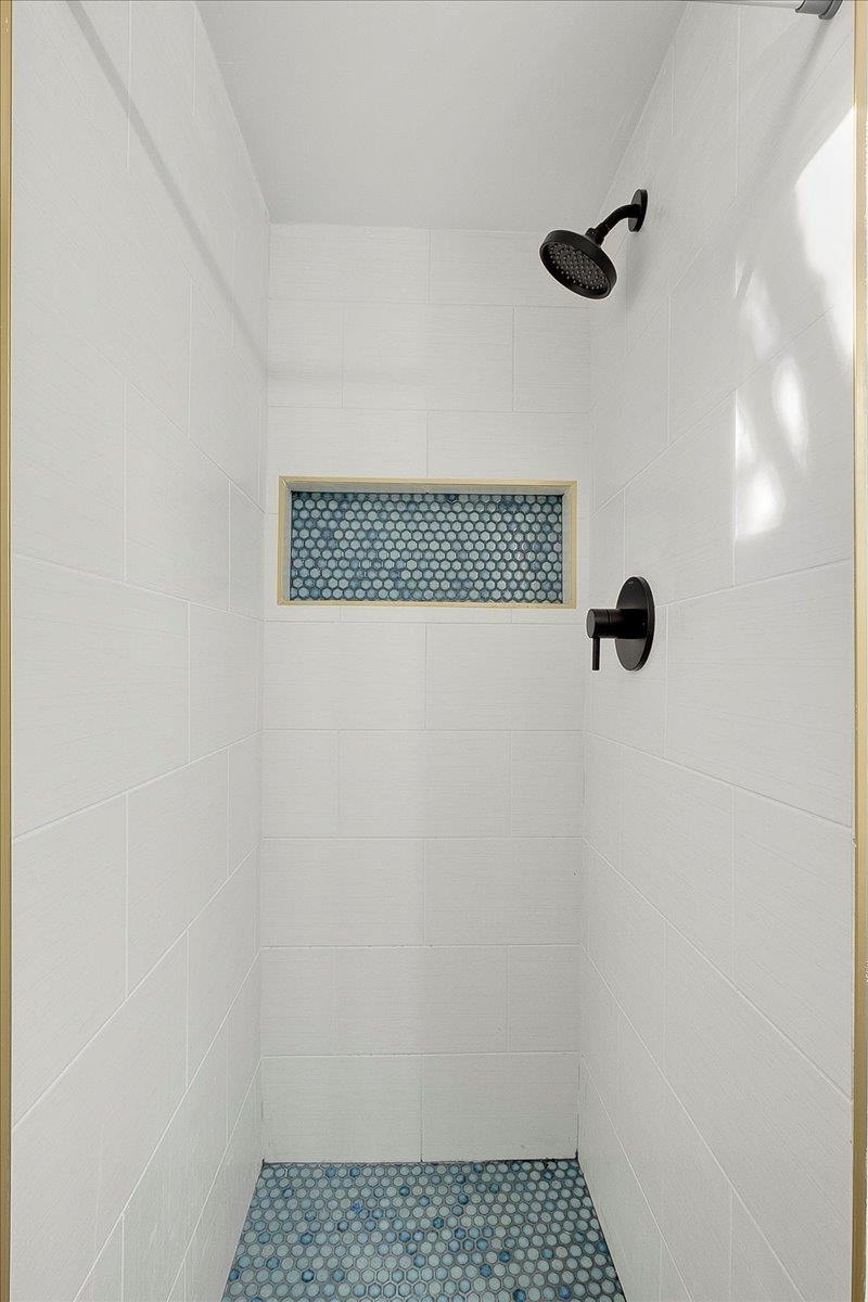211 North State Street Raleigh, NC 27601 - Photo 24 of 50 a bathroom with a shower
