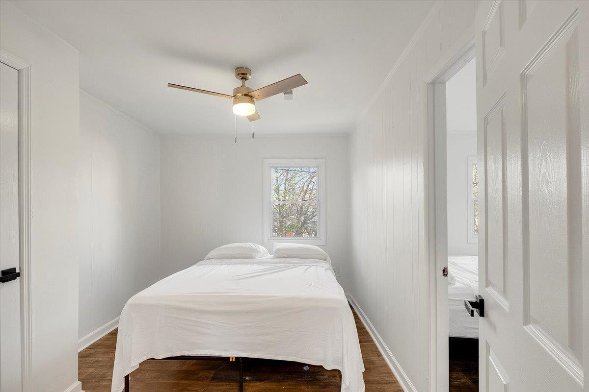211 North State Street Raleigh, NC 27601 - Photo 34 of 50 a bedroom with a bed and a window